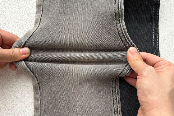 10 Oz Konkurencyjna cena Ostra cena Szary kolor dla mężczyzny Jean Stretch Denim tkanina z chińskiej fabryki