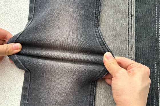 10 Oz Konkurencyjna cena Ostra cena Szary kolor dla mężczyzny Jean Stretch Denim tkanina z chińskiej fabryki
