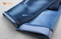 Ciemnoniebieska, powlekana, elastyczna, bawełniana tkanina dżinsowa o masie 12 uncji 100 na podwórku