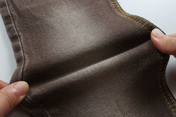 Dobra cena Super Brown Stretch Denim Tkanina Dla Kobiet Mężczyzna Dżinsy Niskie Stretch Konkurencyjna Cena Z Chin Foshan City w Internecie